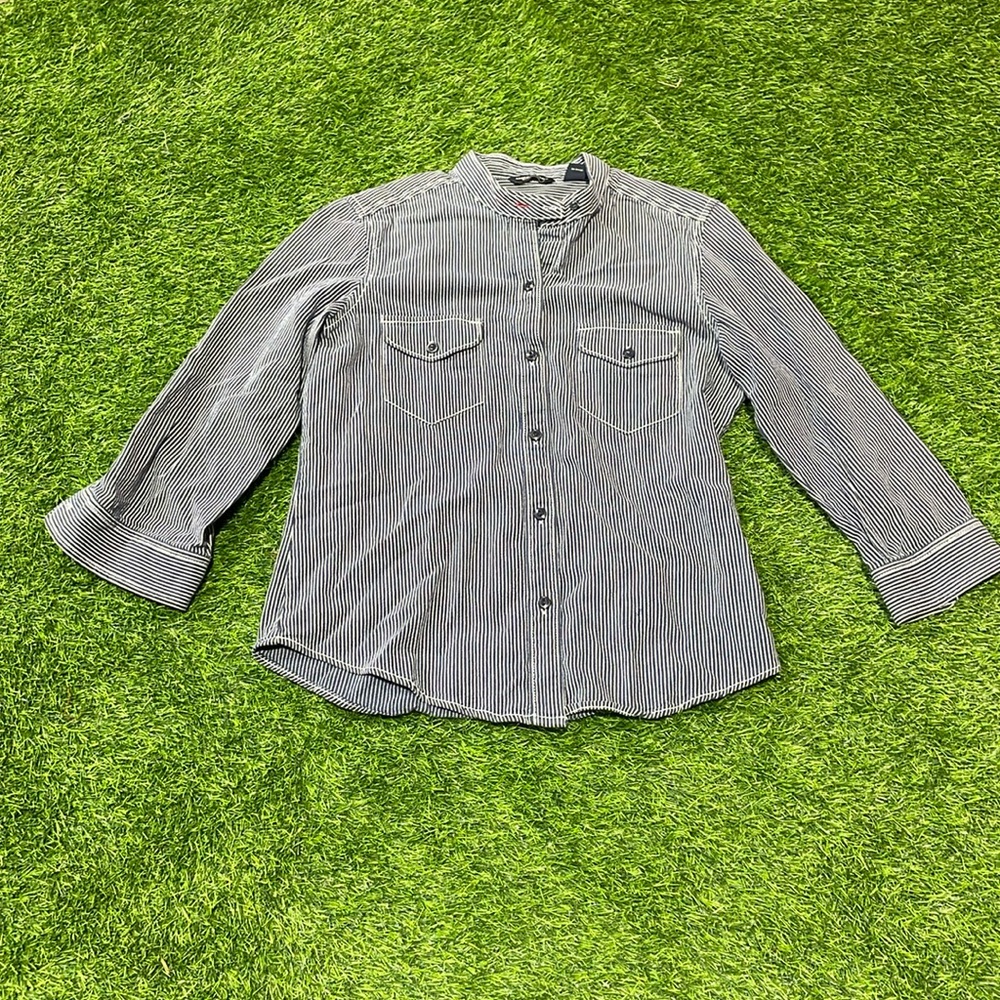 Ladies long sleeve banded collar blue and white pinstriped button up shirt.
